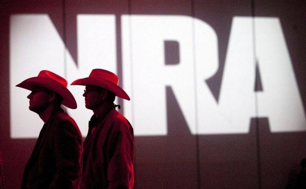 National Rifle Association members listen to speakers during the NRA's 142 annual Meetings and Exhibits at the George R. Brown Convention Center in Houston on May 4, 2013. (Johnny Hanson/Houston Chronicle via AP, File)