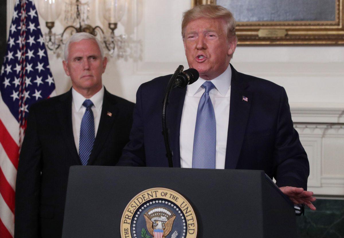 President Donald Trump makes remarks in the Diplomatic Reception Room of the White House as Vice President Mike Pence looks on in Washington on Aug. 5, 2019. (Alex Wong/Getty Images)