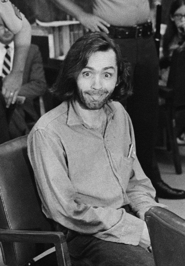 Charles Manson sticks his tongue out at photographers as he appears in a Santa Monica, Calif., on June 25, 1970. (George Brich/AP Photo)