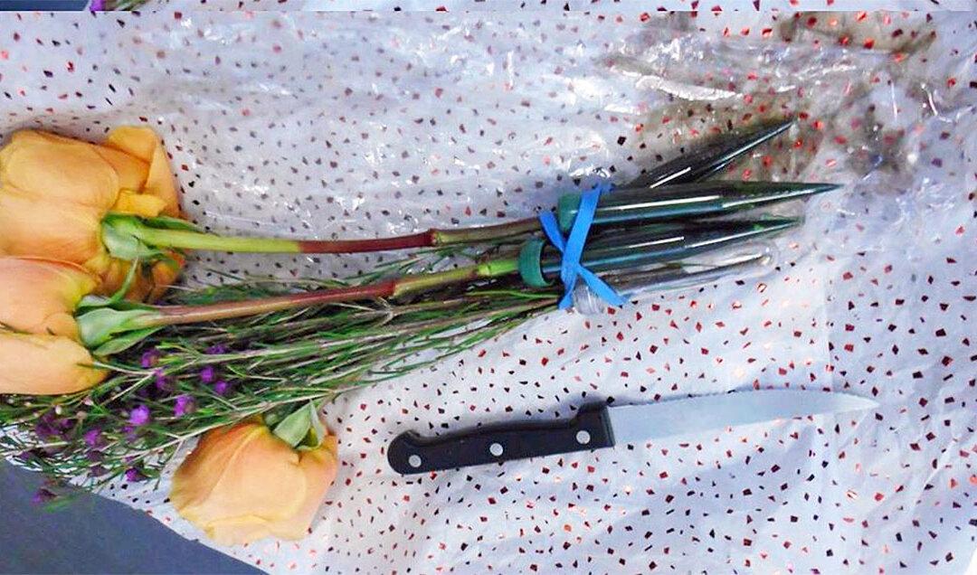 Airport Security Finds Passenger Carrying a Knife in Bunch of Flowers