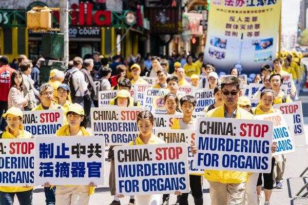 Falun Dafa Day parade in Manhattan, New York City, on May 16, 2019. (Edward Dye/The Epoch Times)