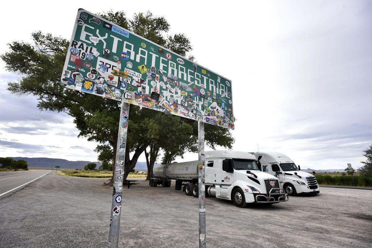 An Extraterrestrial Highway sign covered with stickers is seen along state route 375 on July 22, 2019 near Rachel, Nevada, and the secure U.S. Air Force Facility people apparently want to raid in September. (David Becker/Getty Images)