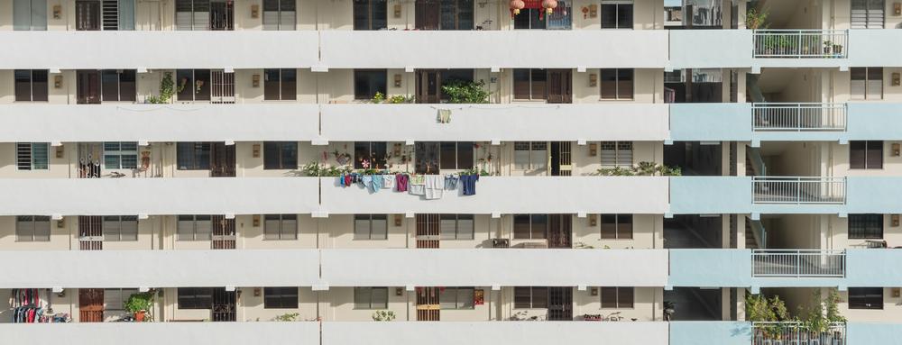 Illustration - Shutterstock | <a href="https://www.shutterstock.com/image-photo/exterior-dense-hdb-apartment-complex-singapore-788901187">Trong Nguyen</a>