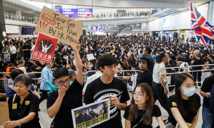 ‘Democracy Now’: Protesters Stage Sit-in at Hong Kong Airport