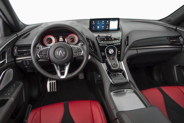 Button-style electronic gear selector and True Touchpad Interface in the center console. (Courtesy of Acura)