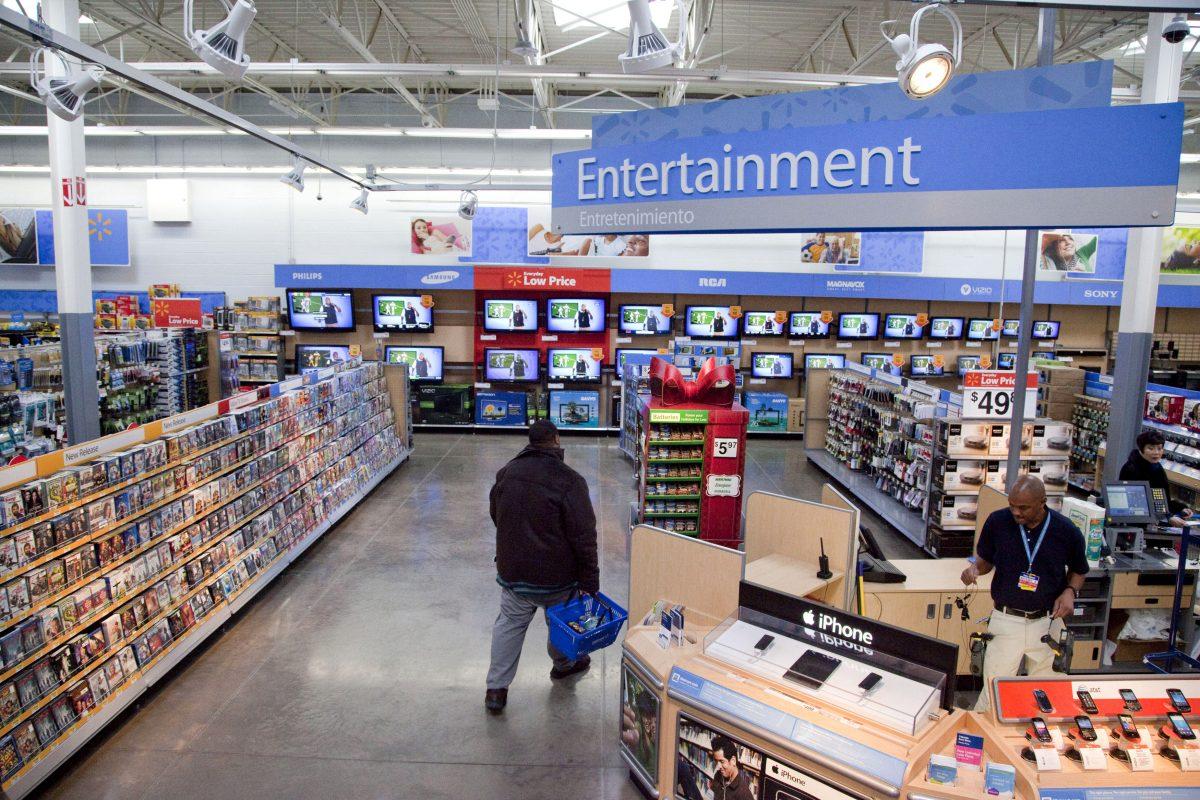 In this Dec. 15, 2010 file photo, a view of the entertainment section of a Wal-Mart store is seen in Alexandria, Va. (AP Photo, File)
