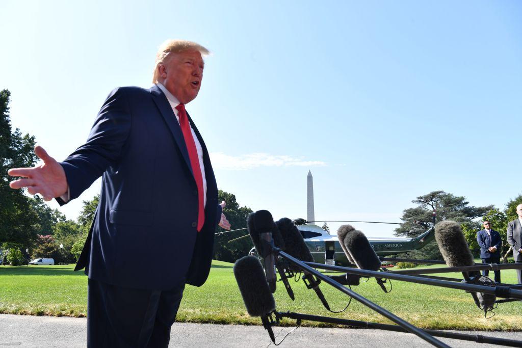 President Donald Trump speaks to the press on the South Lawn of the White House before departing in Washington on Aug. 9, 2019.(Nicholas Kamm/AFP/Getty Images)
