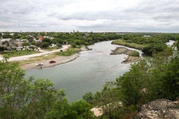 A view of the Rio Grande with the Mexican city of Miguel Aleman on the left, from the Roma Bluffs near Rio Grande City, Texas, on March 22, 2019. (Charlotte Cuthbertson/The Epoch Times)