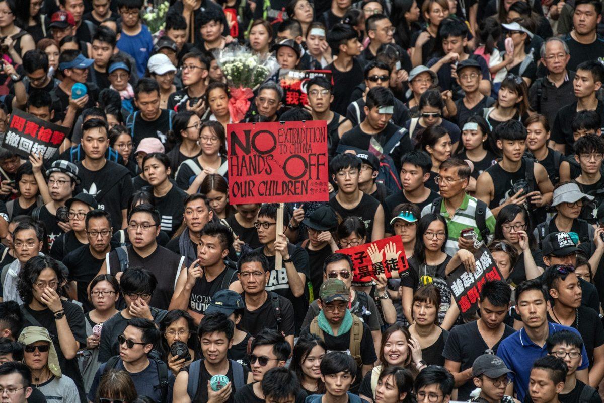 Protesters demonstrate against the now-suspended extradition bill in Hong Kong, on June 16, 2019. (Carl Court/Getty Images)