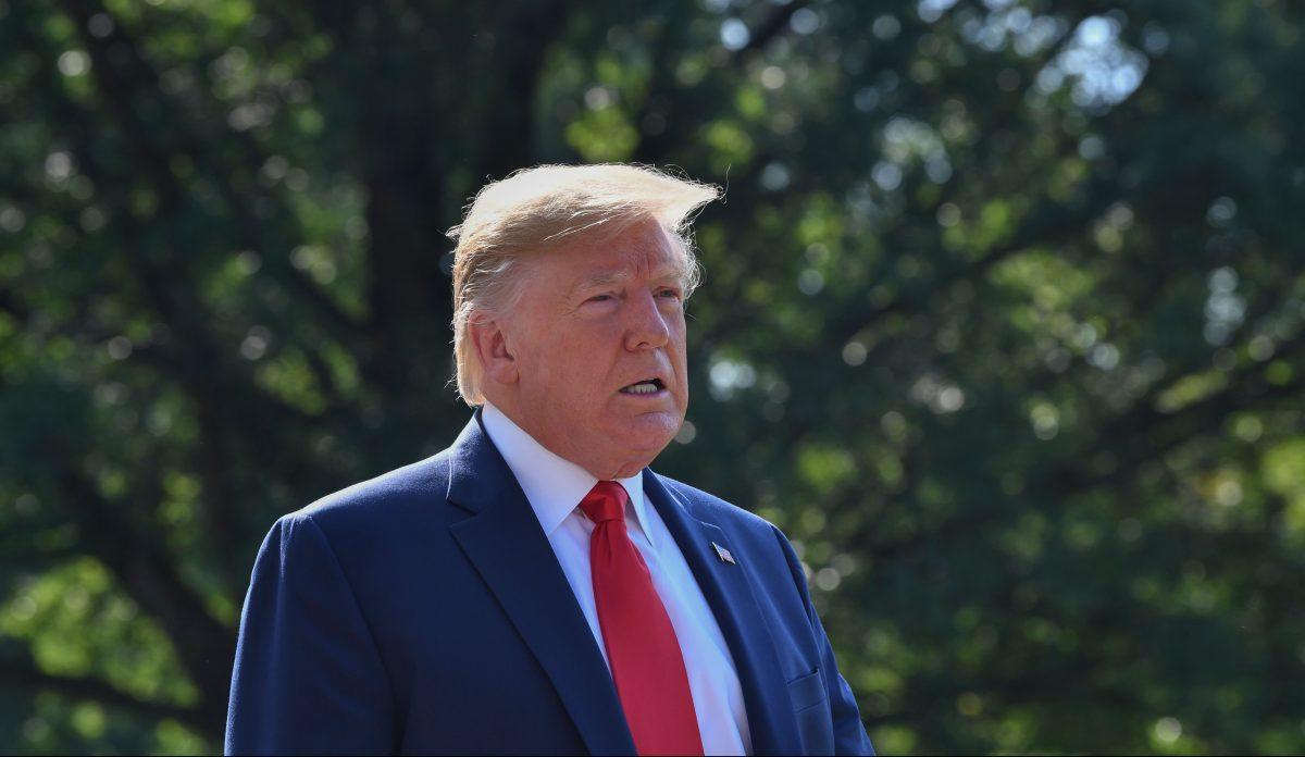 President Donald Trump speaks to the press on the South Lawn of the White House before departing in Washington on Aug. 9, 2019. (Nicholas Kamm/AFP/Getty Images)