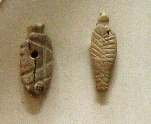 Swaddled babies. Votive offerings from Agia Triada (Crete), Bronze age, 2600-2000 BC. (Creative Commons Attribution-Share Alike 3.0 Unported license.)