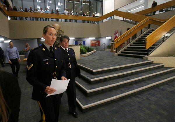 RCMP Corporal Julie Courchaine (L) and Assistant Commissioner Jane MacLatchy prepare to speak to members of the media regarding two bodies believed to be those of fugitives Kam McLeod and Bryer Schmegelsky found near Gillam, MB, at the RCMP "D" Division Headquarters, August 7, 2019. (Shannon VanRaes/Reuters)