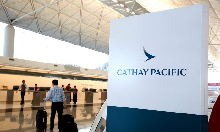 Cathay Pacific Shares Slump After China Cracks Down on Staff Protests