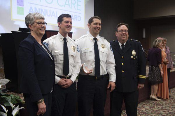 Ivan Mazurkiewicz (2nd L) with his award at the Allina Health Commitment to Care Awards ceremony. (Courtesy of Allina Health)