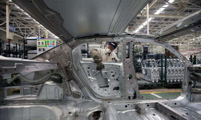 PSA, Dongfeng to Drop Two China Auto Plants, Halve Workforce