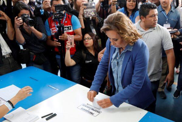 Presidential candidate Sandra Torres, of the National Unity of Hope (UNE) political party, casts her vote at a polling station during the presidential election second round run-off vote in Guatemala City, Guatemala, Aug. 11, 2019. (Luis Echeverria/Reuters)