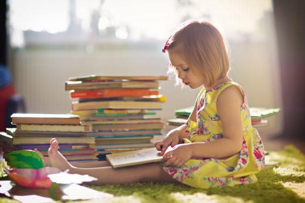 If reading hasn’t been a frequent activity this summer, stoke the flames a bit by embarking on reading-centered activities. Take the kids to the library or the bookstore. (Shutterstock)
