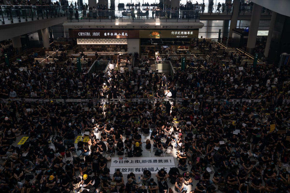 Protesters occupy the arrival hall of the Hong Kong International Airport during a demonstration in Hong Kong, on Aug. 12, 2019. (Anthony Kwan/Getty Images)