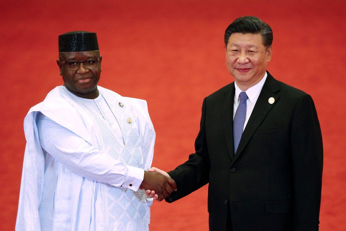 Sierra Leone's President Julius Maada Bio shakes hands with Chinese leader Xi Jinping during the Forum on China-Africa Cooperation at the Great Hall of the People in Beijing on Sept. 3, 2018. (Andy Wong/AFP/Getty Images)