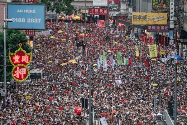Protesters march on a street during a rally against a controversial extradition law proposal in Hong Kong on June 9, 2019. (Anthony Kwan/Getty Images)