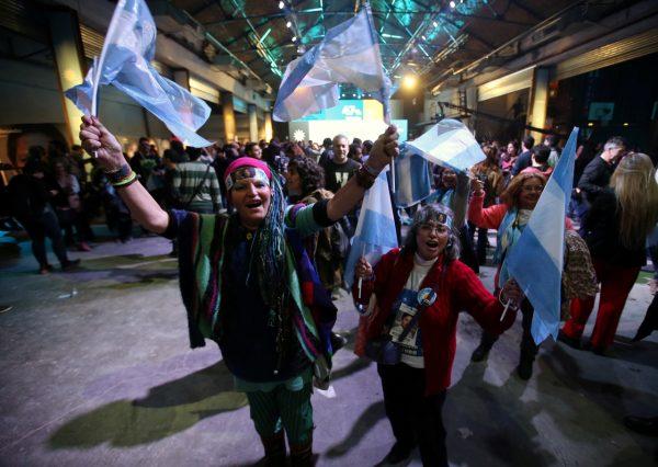Supporters of presidential candidate Alberto Fernández react after the primary elections, at a cultural centre in Buenos Aires, Argentina, on Aug. 12, 2019. (Agustin Marcarian/Reuters)