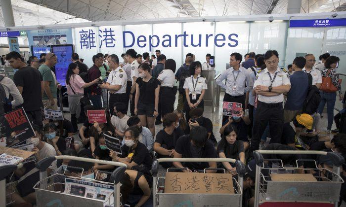 Flights Out of Hong Kong Canceled Again Amid Protests