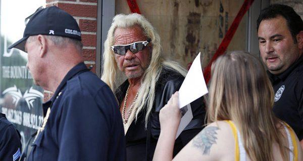Dog the Bounty Hunter Star Duane Chapman (C) with his daughter Bonnie (front R) in Edgewater, Colo., on Aug. 2, 2019. (David Zalubowski/AP Photo)