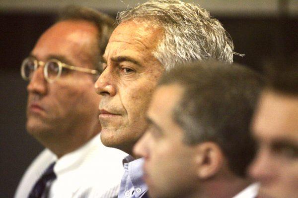 Jeffrey Epstein, center, appears in court in West Palm Beach, Florida, in this July 30, 2008 file photo. (Uma Sanghvi/Palm Beach Post via AP, File)