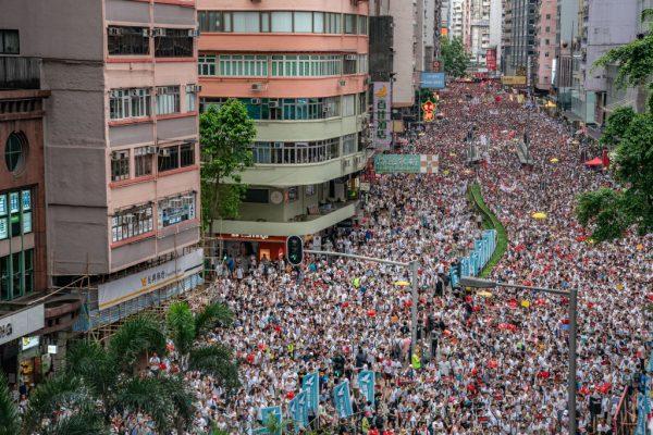 Protesters march on a street during a rally against a controversial extradition bill in Hong Kong on June 9, 2019. (Anthony Kwan/Getty Images)