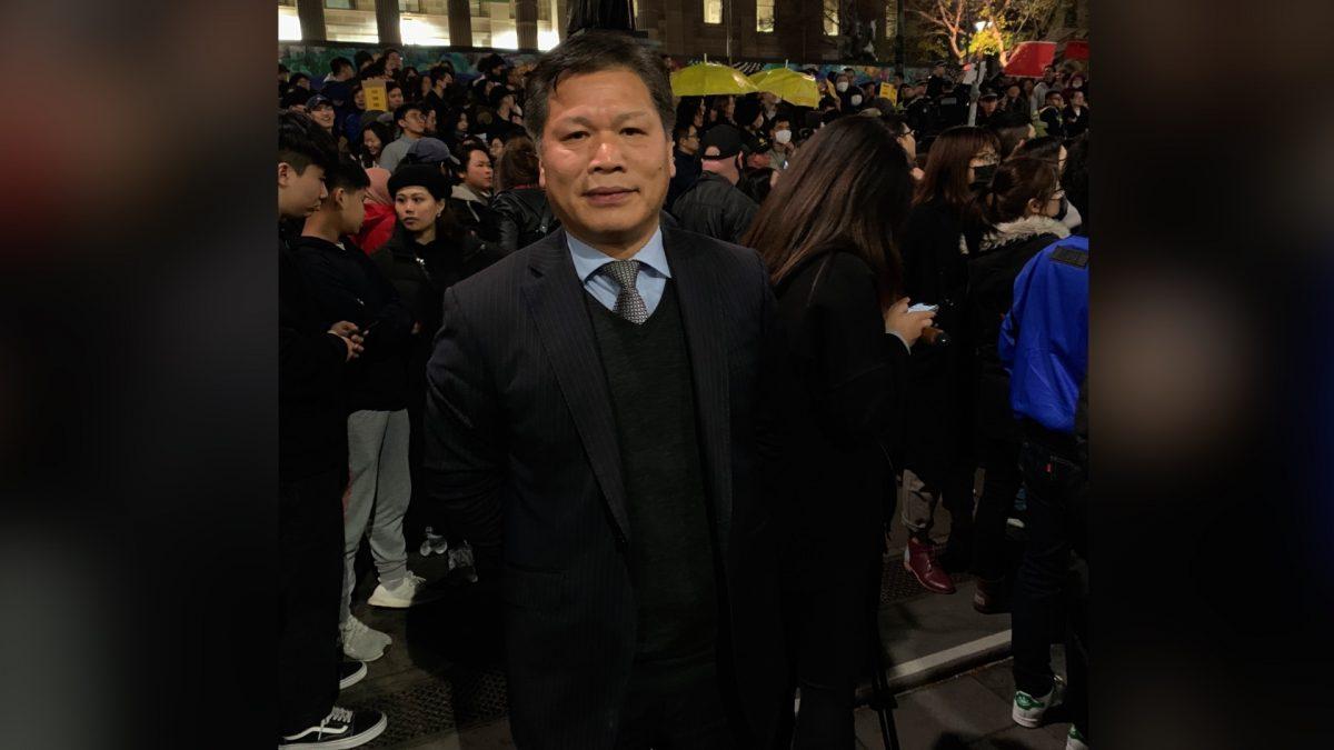 Ruan (Frank) Jie, an editor at Tiananmen Times, attended the Hong Kong rally in Melbourne, Australia on 16 August 2019. (The Epoch Times)