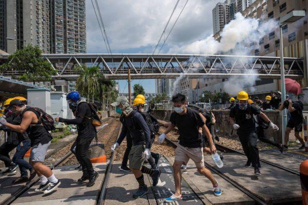 Riot police fire tear gas toward protestors outside Tin Shui Wai police station in Hong Kong during a protest on Aug. 05, 2019. (Billy H.C. Kwok/Getty Images)
