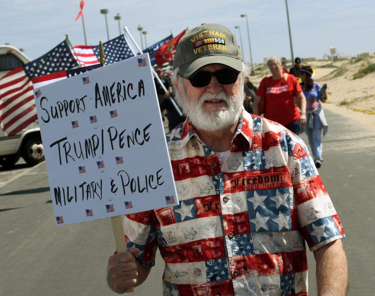 Supporters of US President Trump march during the "Make America Great Again" rally in Huntington Beach, California on March 25, 2017. (Mark Ralston/AFP/Getty Images)