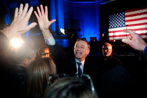 Former Colorado Governor John Hickenlooper greets supporters after his campaign kick-off rally for the 2020 U.S. presidential race at Civic Center Park in Denver, Col., on Mar. 7, 2019. (Jason Connolly/AFP/Getty Images)