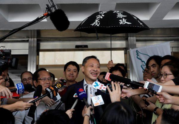 Occupy Central leader Benny Tai (C) talks to reporters outside the High court in Hong Kong on Aug. 15, 2019. (Vincent Yu/AP Photo)