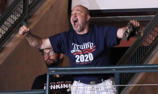 Trump supporter Frank Dawson cheers after helping to eject a small group of protesters during U.S. President Donald Trump’s rally with supporters in Manchester, New Hampshire U.S. August 15, 2019. (REUTERS/Jonathan Ernst)