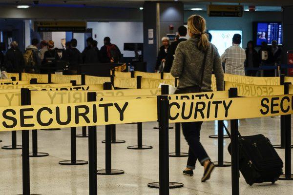 Passengers make their way in a security checkpoint at the International JFK airport in New York on Oct. 11, 2014. (Eduardo Munoz/File photo/Reuters)