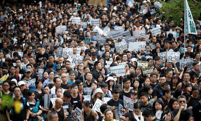 Hong Kongers Stage More Anti-Government Protests, Braving Storms