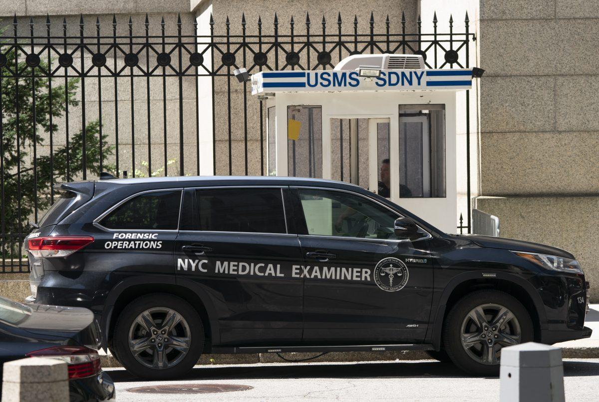 A New York Medical Examiner's car is parked outside the Metropolitan Correctional Center where financier Jeffrey Epstein was being held, in New York on Aug. 10, 2019. (Don Emmert/AFP/Getty Images)