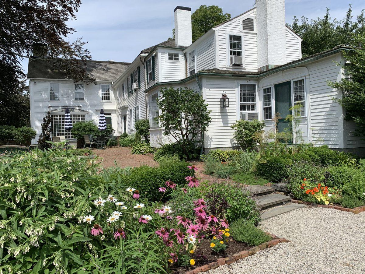 Gardens outside the Governor Bradford House at Mount Hope Farm. The Georgian-style house was built in 1745 and now includes five guest rooms, each influenced by a historical owner of the farm. (Skye Sherman)