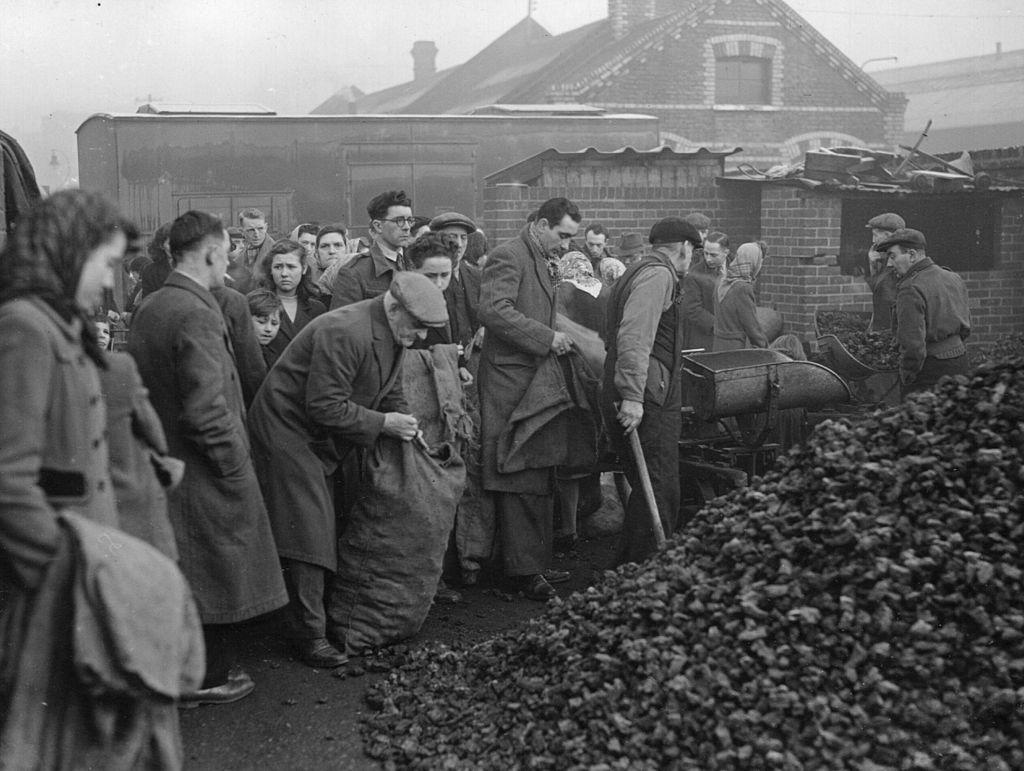 Coal sacks being filled for the long, cold winter, circa 1948 (Hulton Archive/Getty Images)