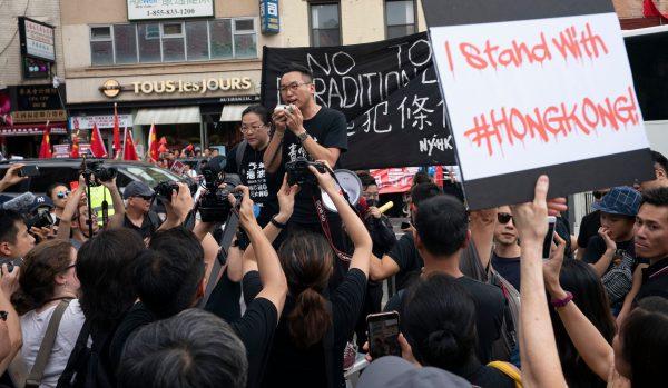 Hong Kong Civic Party leader Alvin Yeung delivers a speech in Confucius Plaza in support of protesters in Hong Kong in New York on Aug. 17, 2019. (Don Emmert/AFP/Getty Images)