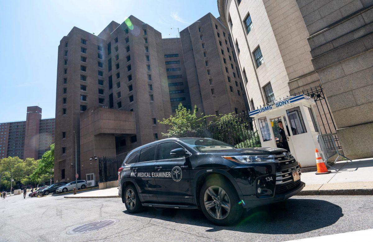 A New York Medical Examiner's car is parked outside the Metropolitan Correctional Center where financier Jeffrey Epstein was held at, on Aug. 10, 2019, in New York. (Don Emmert/AFP/Getty Images)