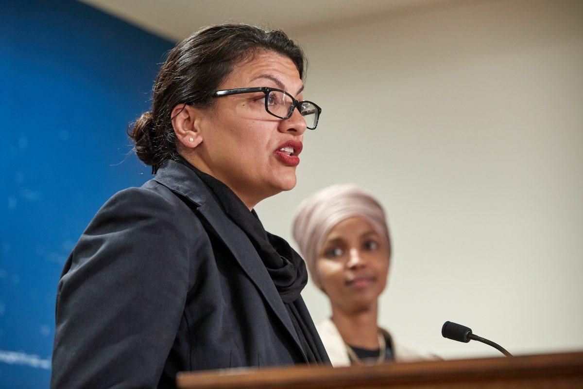 Reps. Rashida Tlaib (D-Mich.), left, and Ilhan Omar (D-Minn.) hold a press conference in St. Paul, Minnesota on Aug. 19, 2019. (Adam Bettcher/Getty Images)