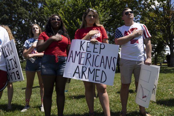 File photo showing people singing the national anthem during a rally promoting Second Amendment rights, in Washington, on July 7, 2018. (Toya Sarno Jordan/Getty Images)