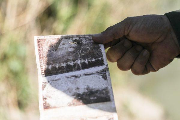 An ultrasound printout is found on the banks of the Rio Grande where many illegal aliens are ferried across in rafts by smugglers from Mexico, near McAllen, Texas, on April 18, 2019. (Charlotte Cuthbertson/The Epoch Times)