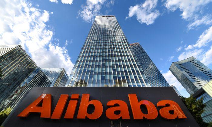 Alibaba Postpones Up to $15 Billion Hong Kong Listing Amid Protests: Sources