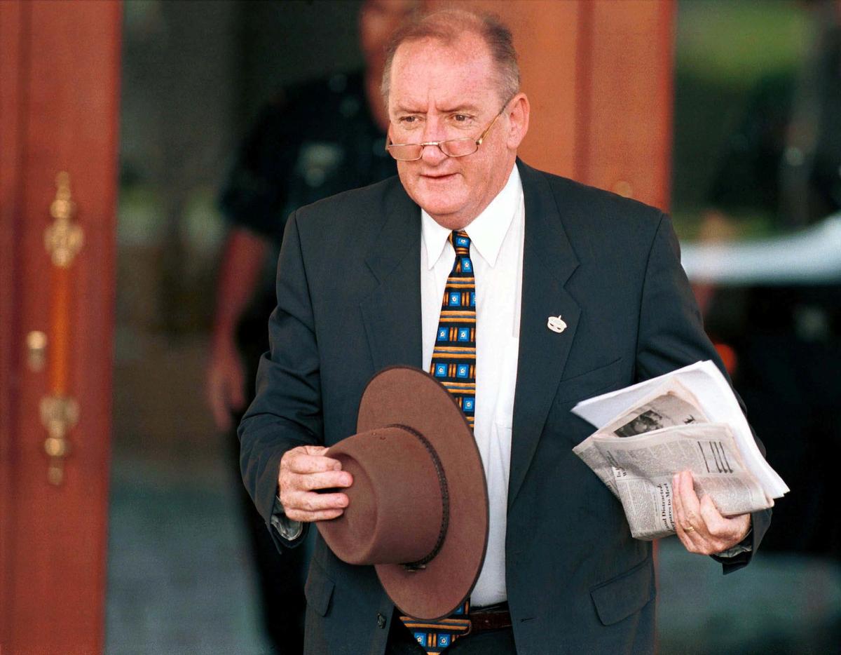 Then-Trade Minister of Australia Tim Fischer arrives for the second day of the 10th Asia-Pacific Economic Cooperation Ministerial Meeting in Kuala Lumpur Nov. 15, 1998. (Reuters/Bobby Yip/File Photo)
