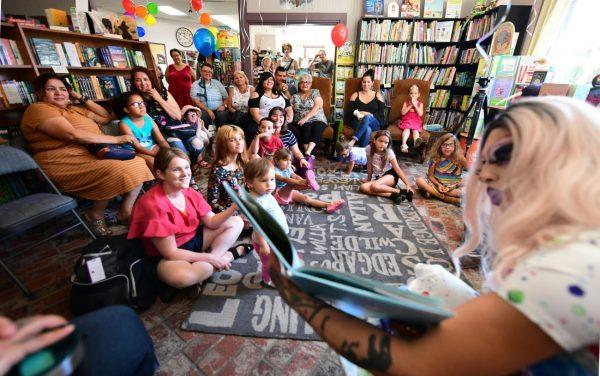 A drag queen reads to adults and children in Riverside, Calif., on June 22, 2019. (Frederic J. Brown/AFP/Getty Images)
