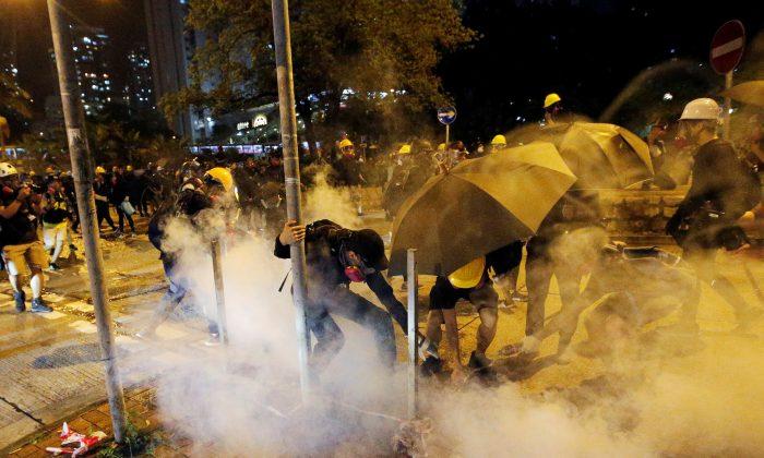 Hong Kong Protests Met With Tear Gas, China Frees UK Mission Staffer