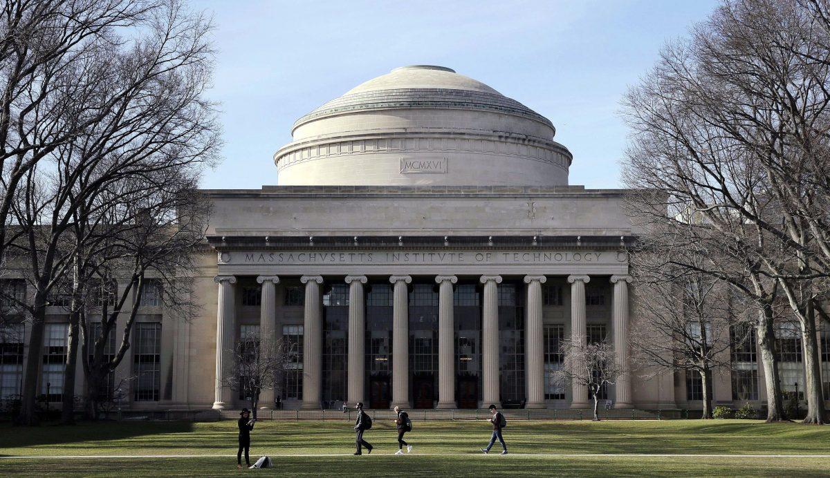 Students walk past the "Great Dome" atop Building 10 on the Massachusetts Institute of Technology campus in Cambridge, Mass., on April 3, 2017. (Charles Krupa/AP Photo)